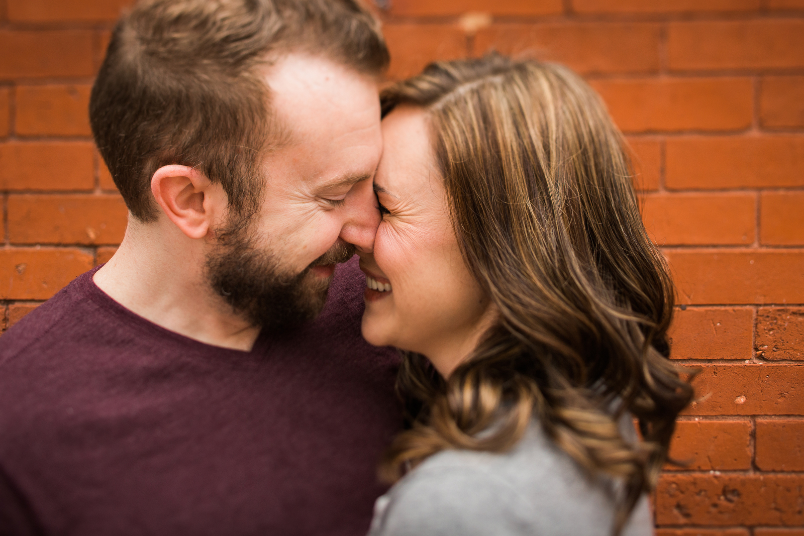 giggling romantic engagement photos