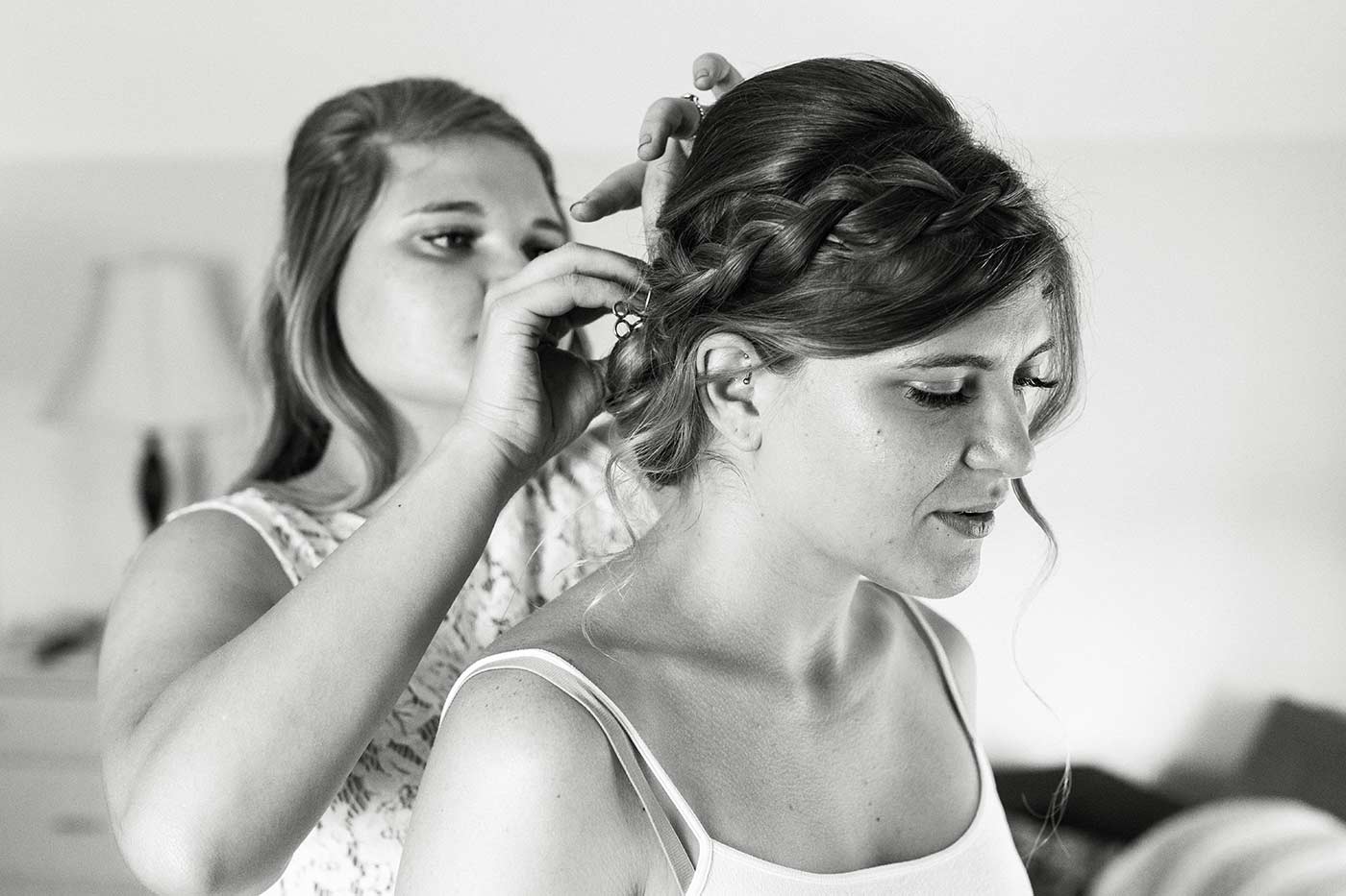bride having her hair styled