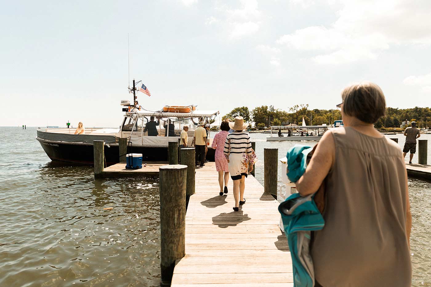 people boarding small boat