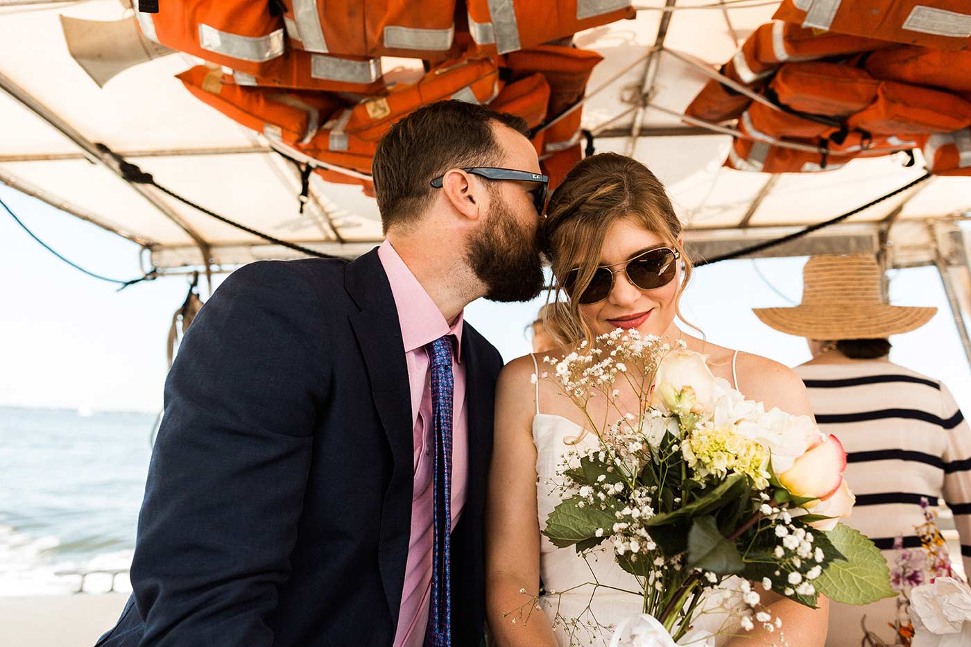 bride and groom on boat