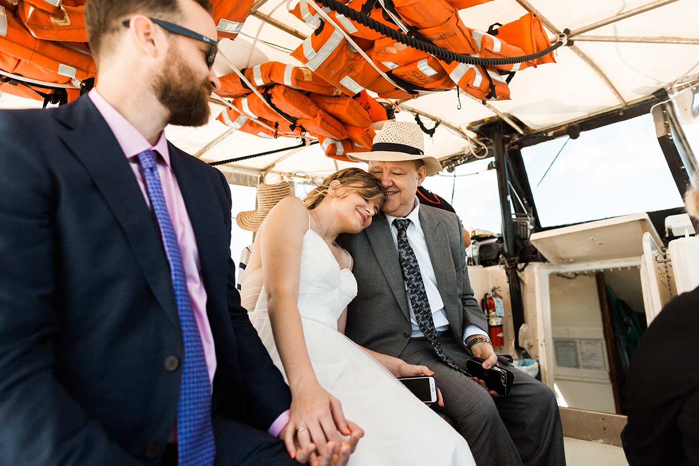 bride, groom, and father of the bride