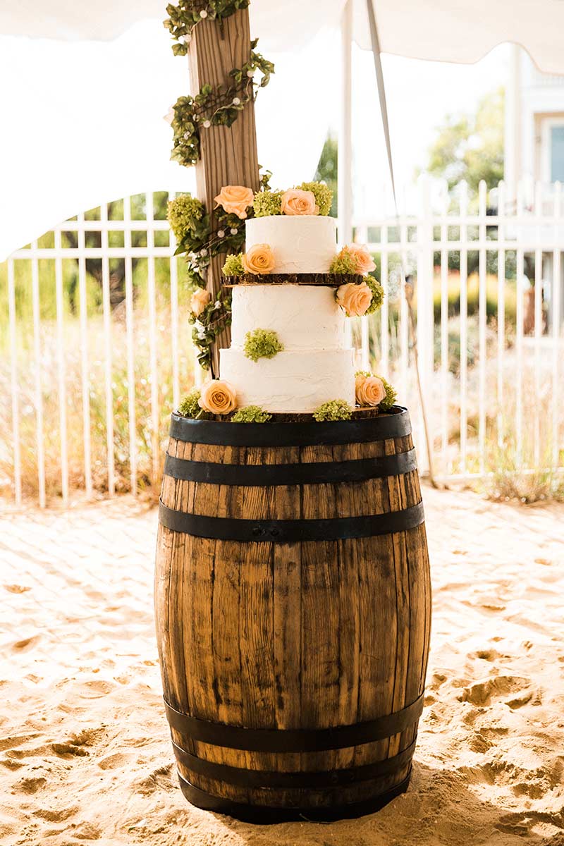 wedding cake on top of barrel