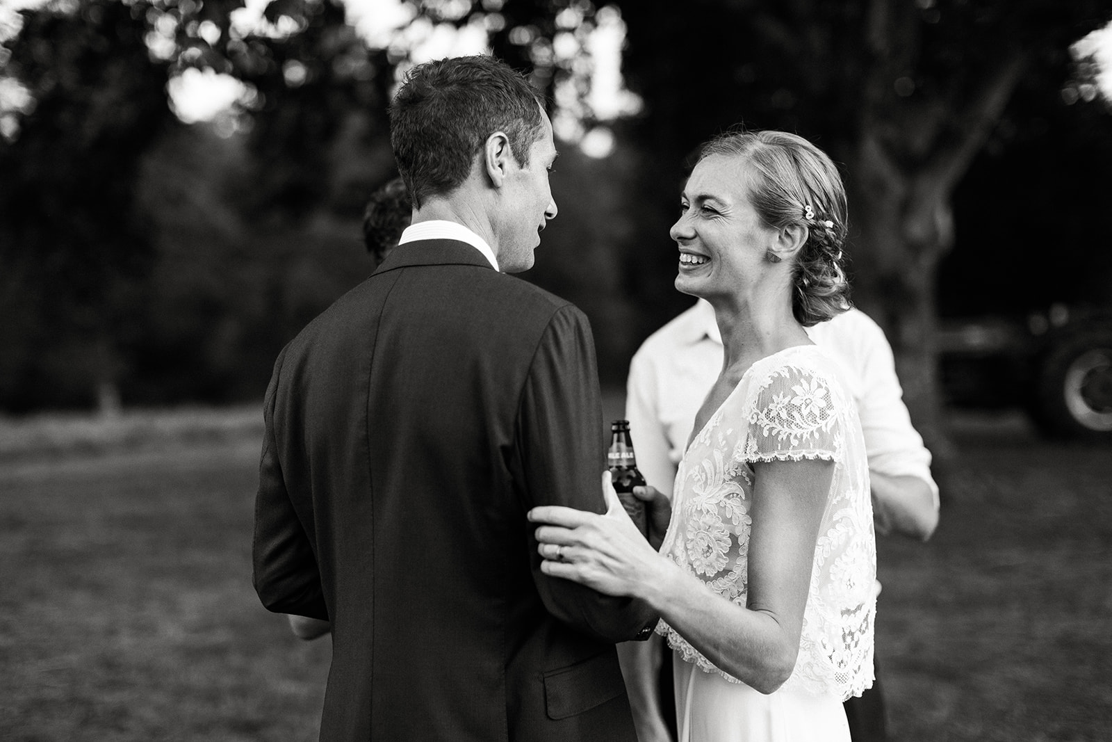 bride and groom laughing