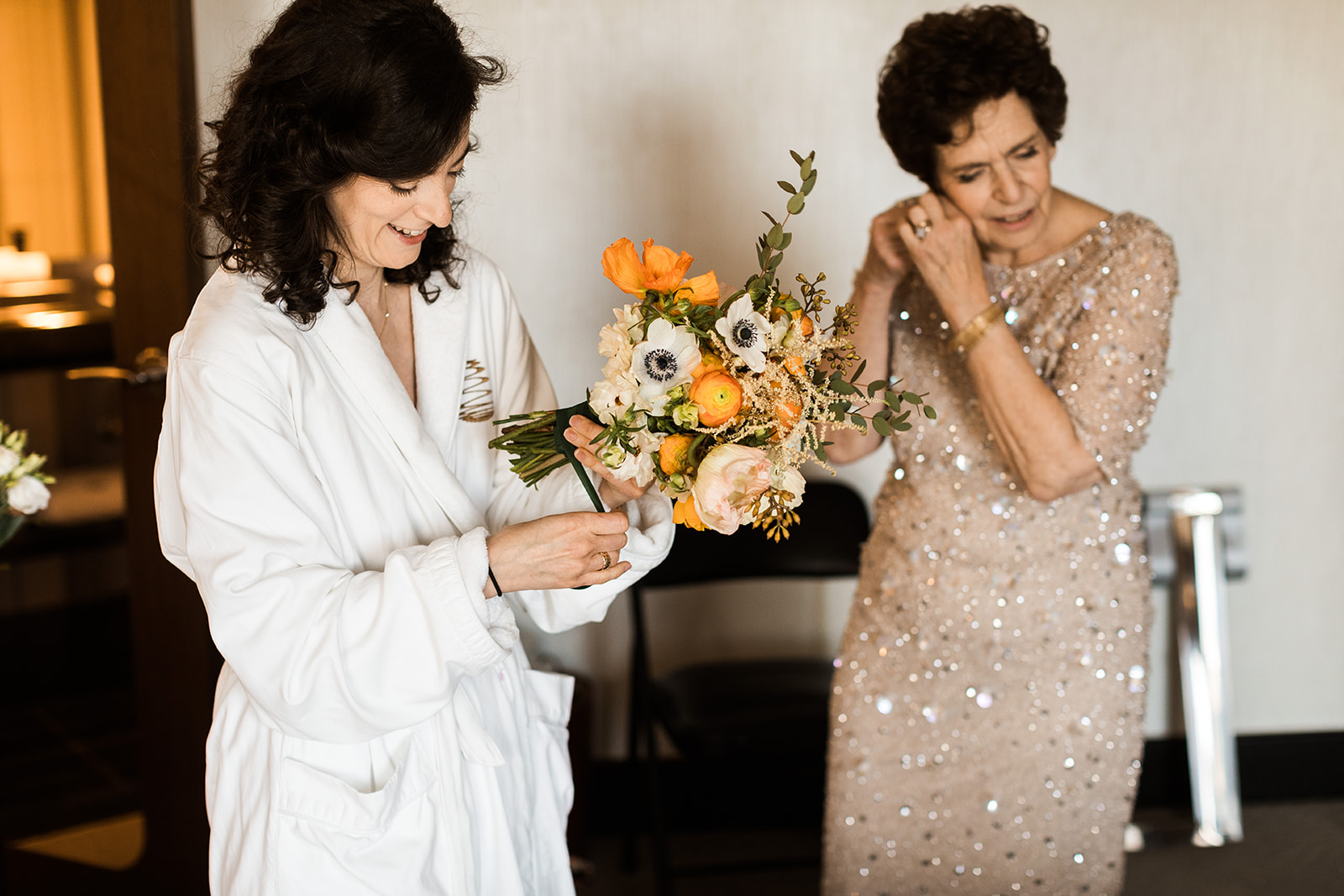 bride getting ready with bouquet