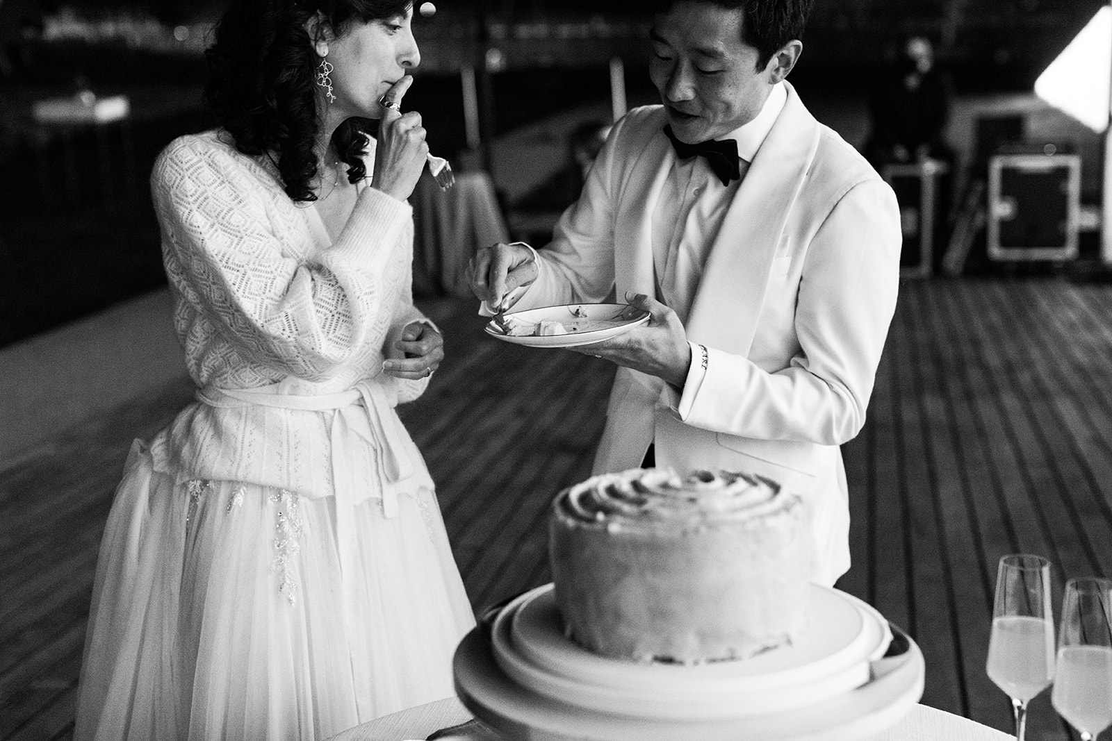 bride and groom eating cake