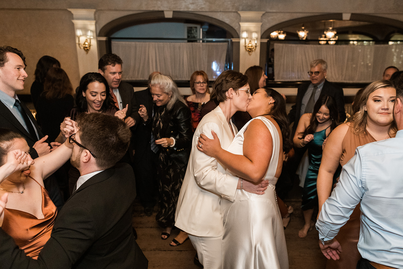 lgbtq+ wedding couple kissing