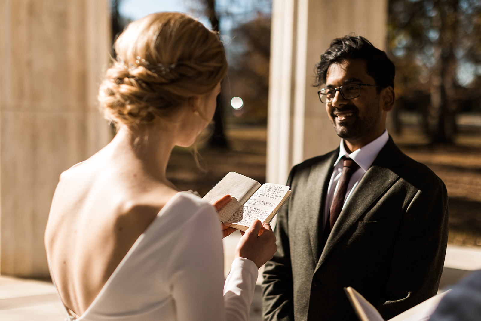 bride reading vows to groom