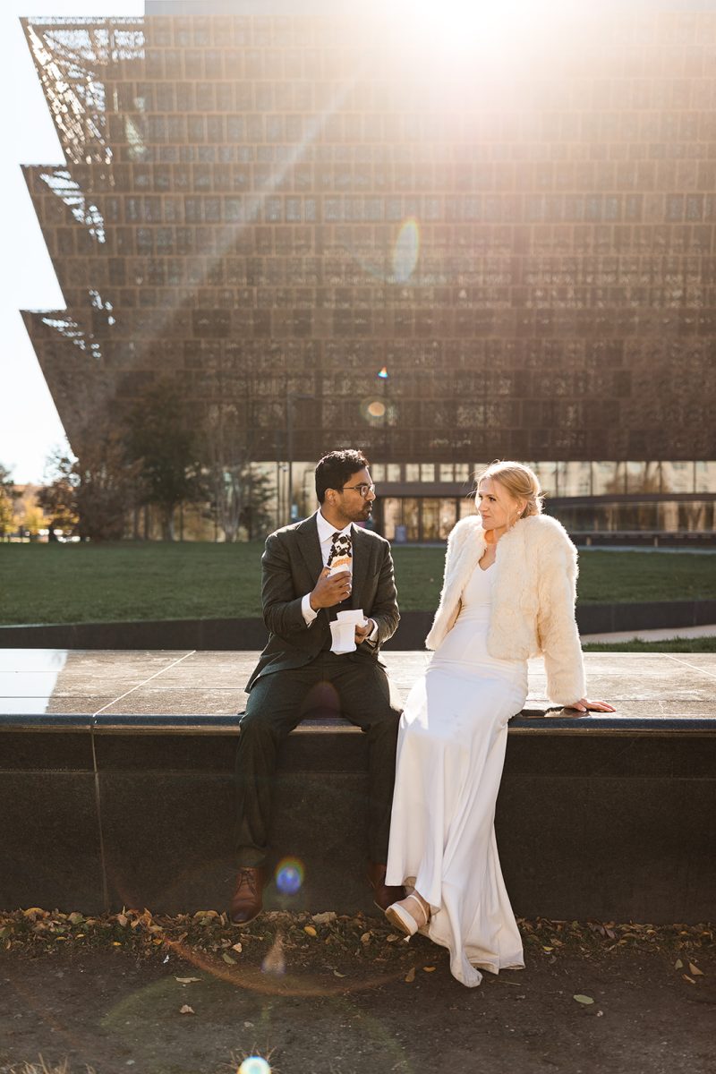 bride and groom eating ice cream cone