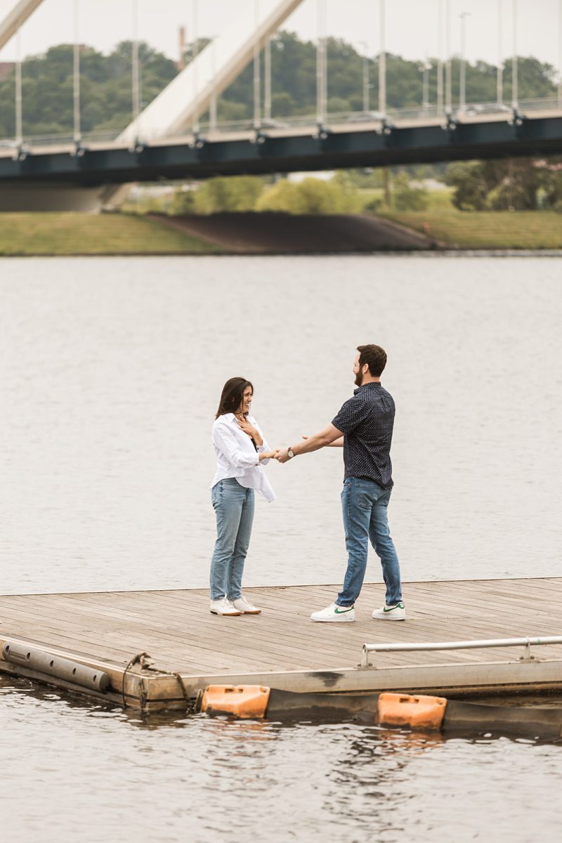 man and woman on dock on potomac river