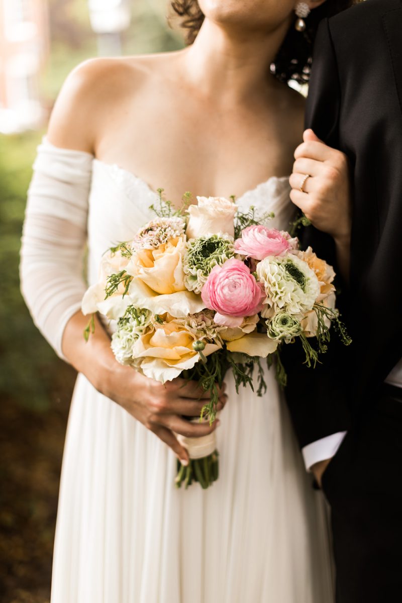 bridal bouquet in pink, yellow, and cream 