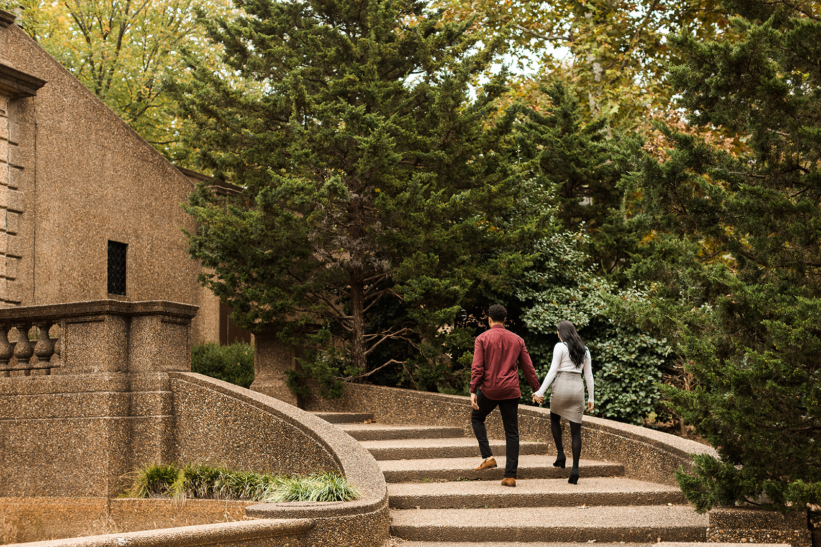man and woman walking up steps in meridian hill park in washington dc 
