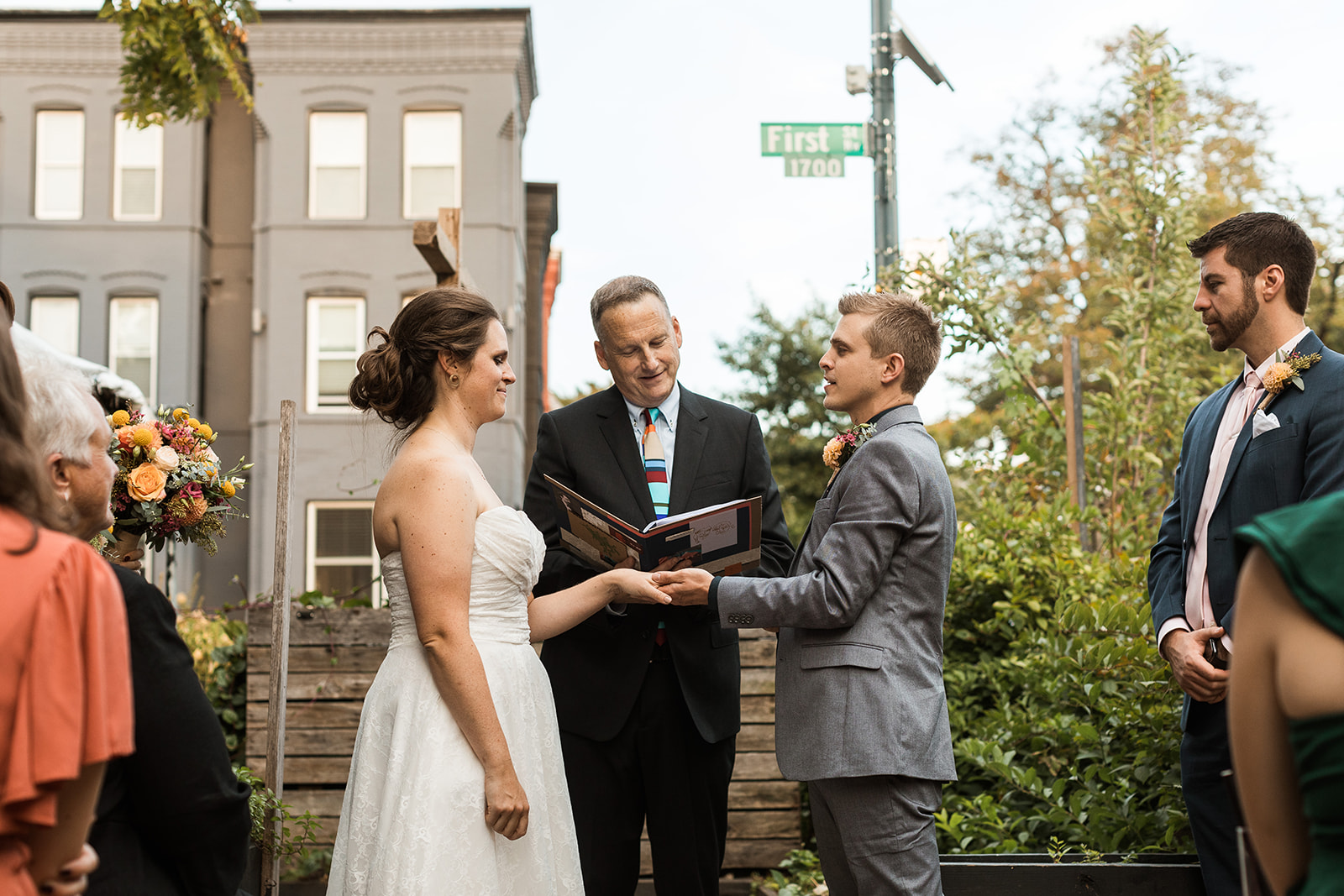 bride and groom ring exchange during ceremony in washington dc 