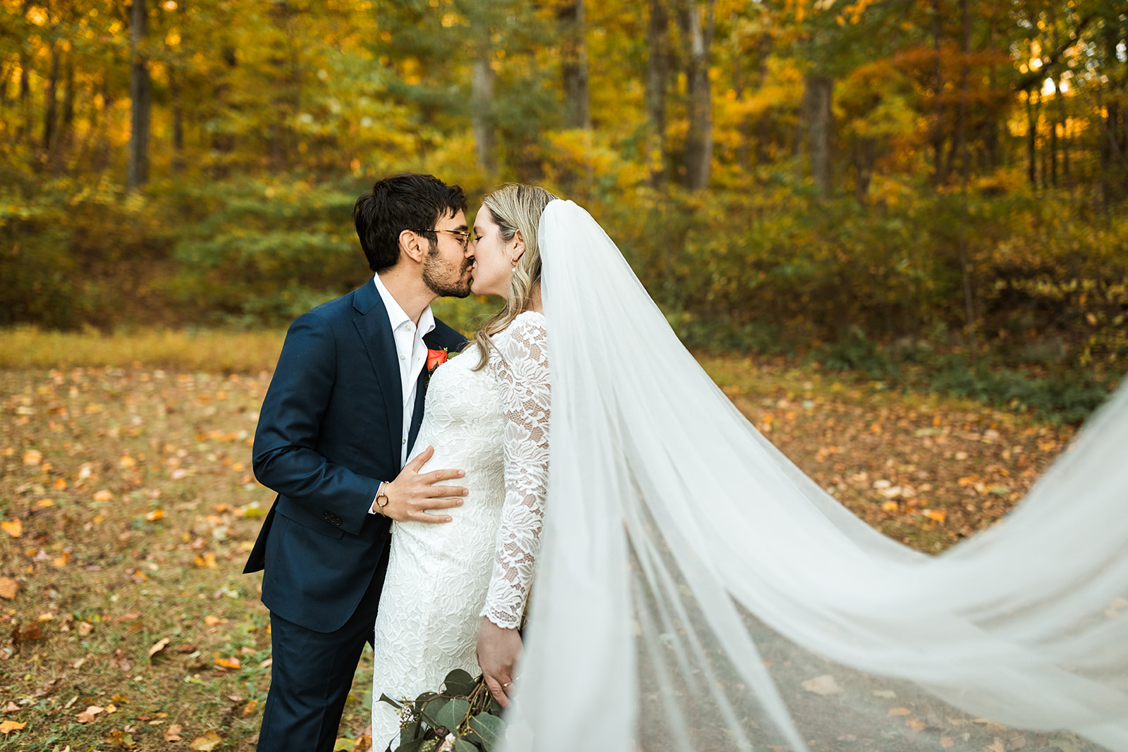 bride and groom portraits surrounded by lush fall forest landscapes in shenandoah