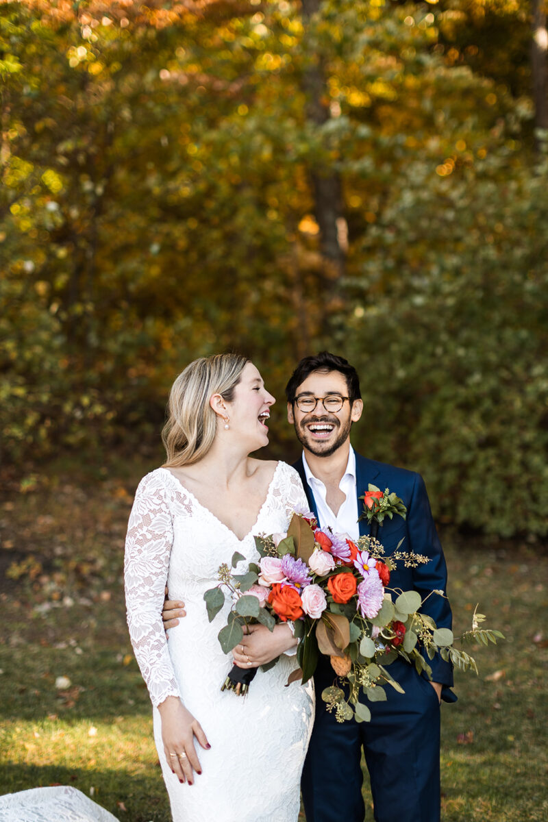 bride and groom portraits surrounded by lush fall forest landscapes in shenandoah