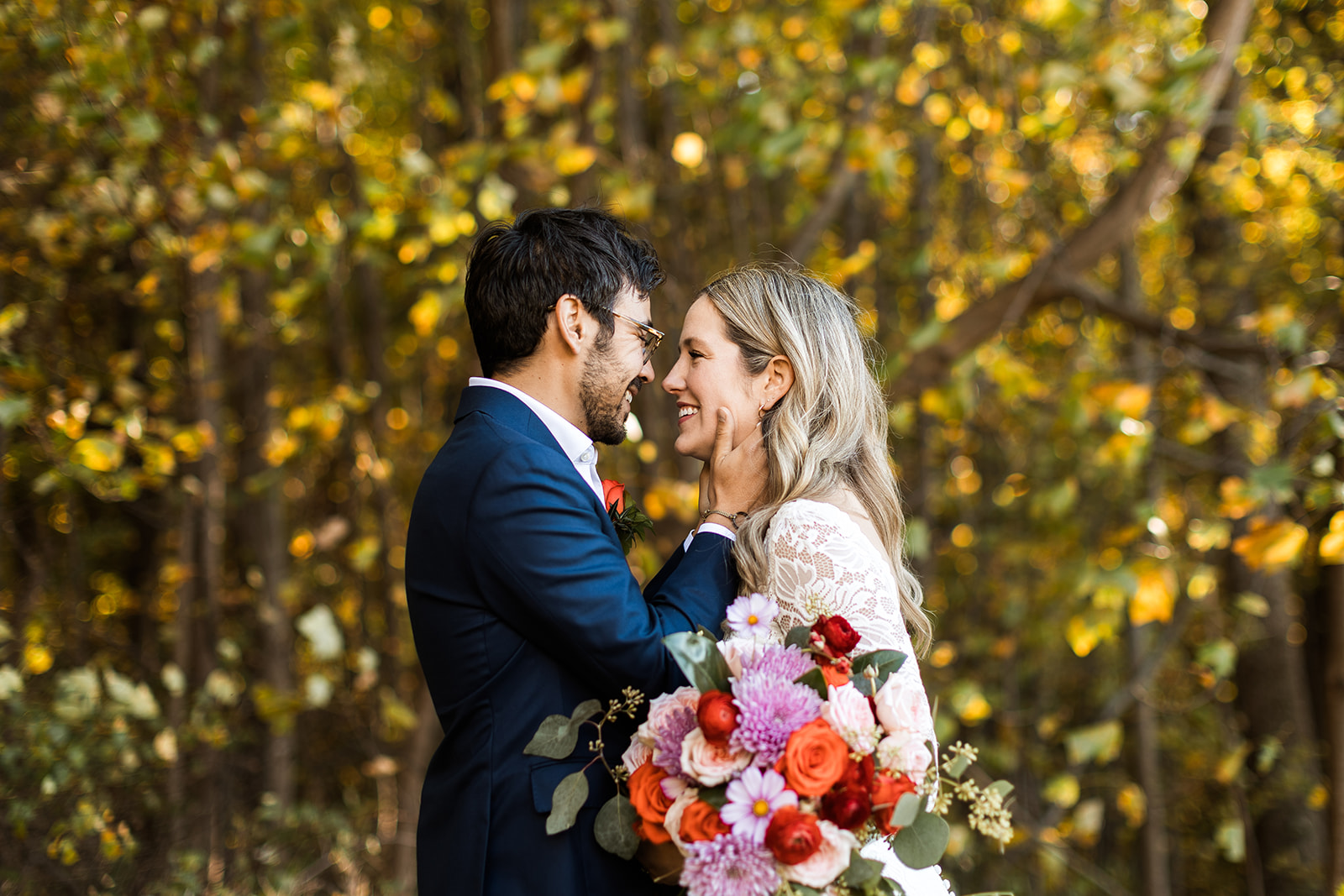 bride and groom portraits surrounded by lush fall forest landscapes in shenandoah