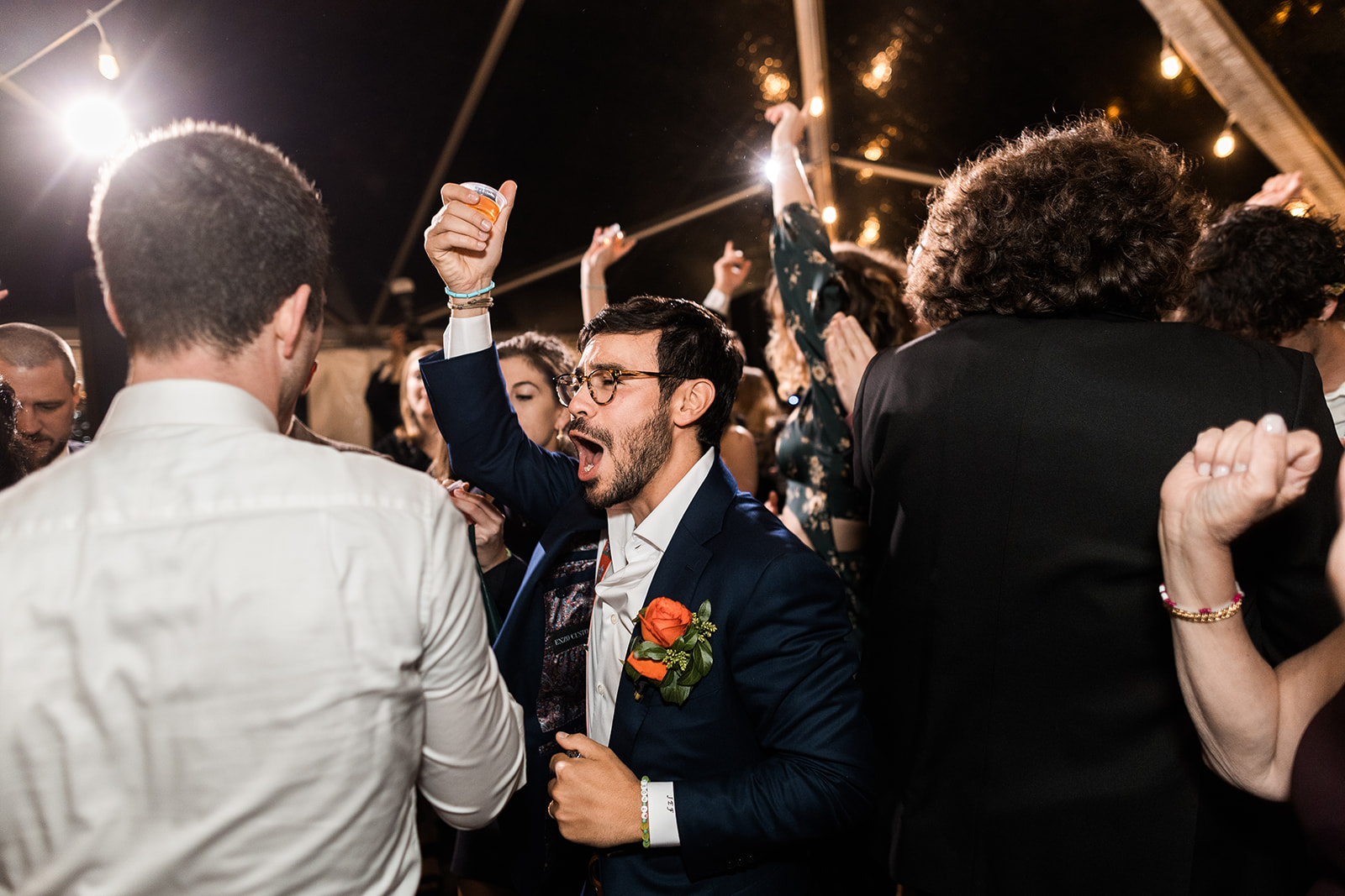 candid wedding reception dancing moments during a backyard wedding in shenandoah