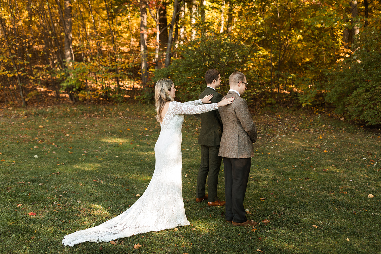 bride and brothers first look