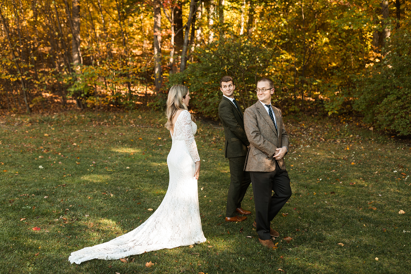 bride and brothers first look