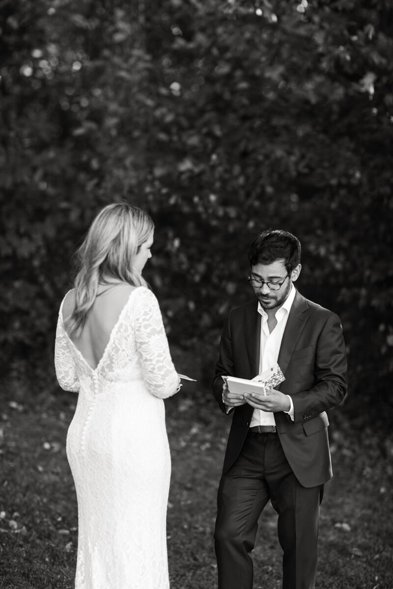 bride and groom exchanging private vows