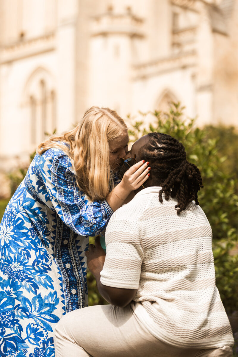 candid garden proposal moments at bishop's garden in front of the national cathedral in dc