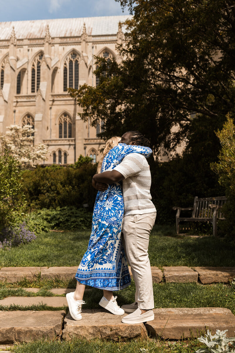 candid garden proposal moments at bishop's garden in front of the national cathedral in dc