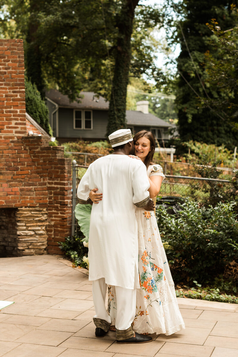 bride and groom wedding portraits in their backyard during their wedding at home in virginia