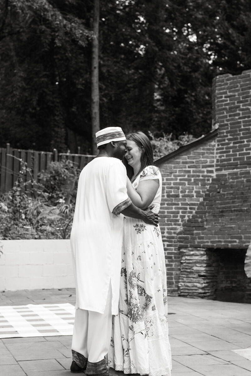 bride and groom wedding portraits in their backyard during their wedding at home in virginia