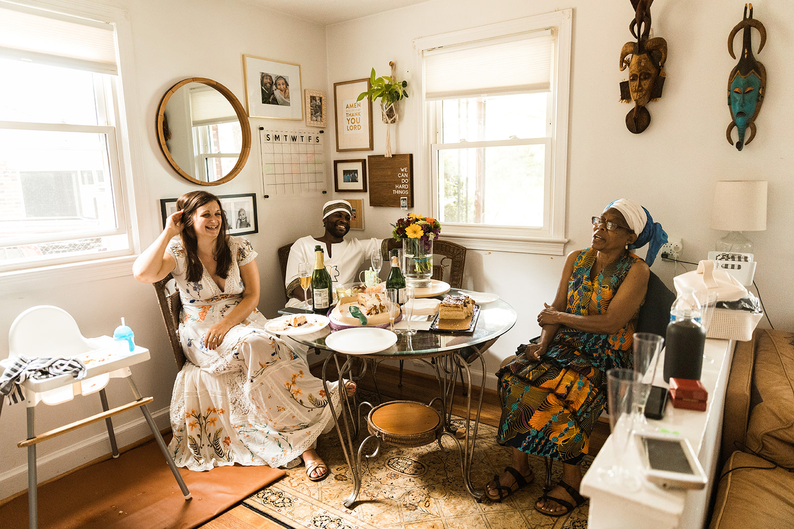 bride and groom celebrating their wedding at home with family