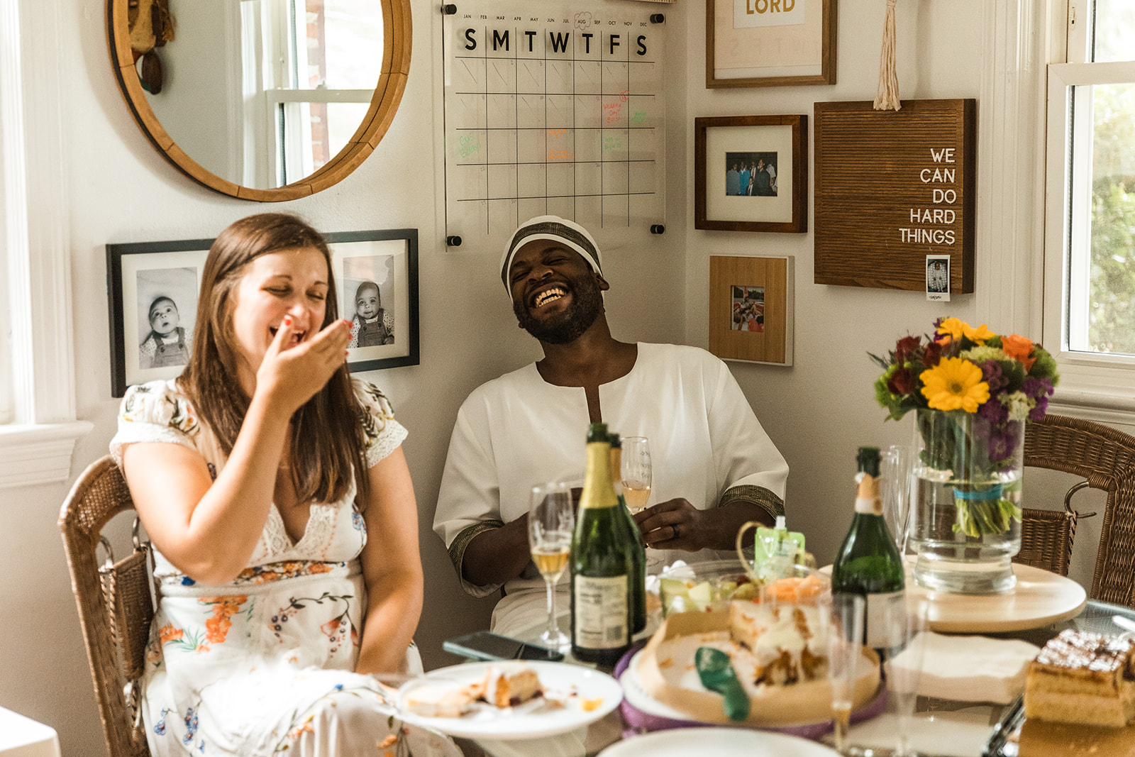 bride and groom celebrating their wedding at home with family