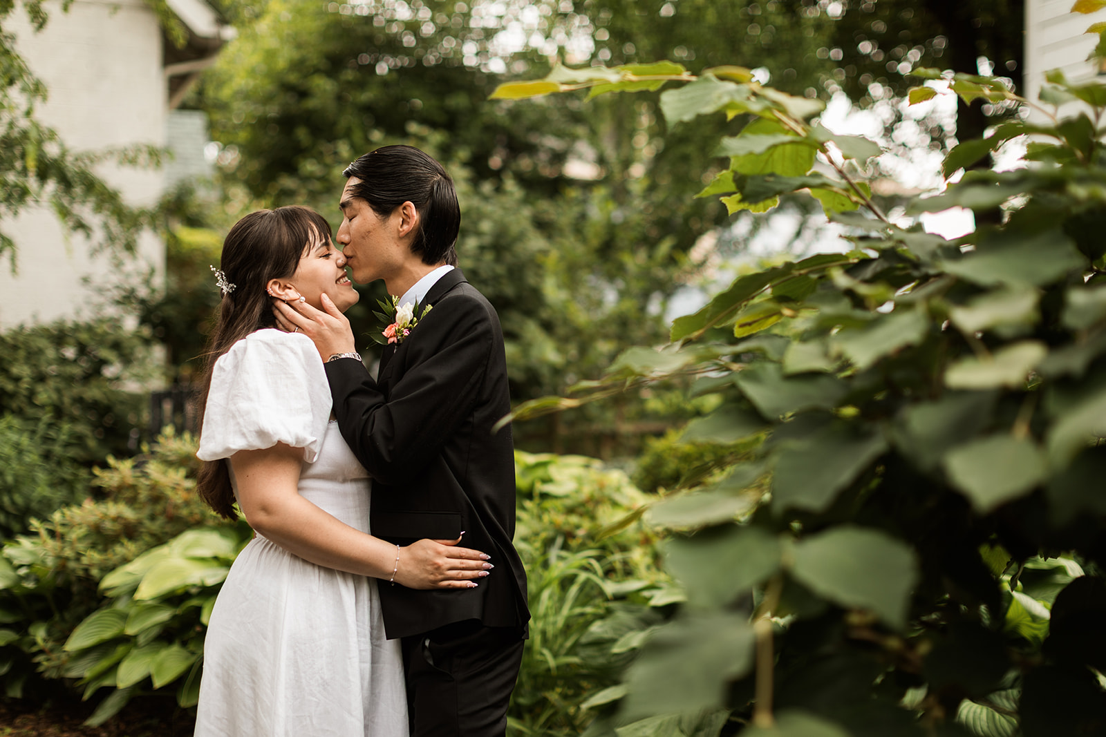 romantic bride and groom moments surrounded by lush greenery in old town fairfax