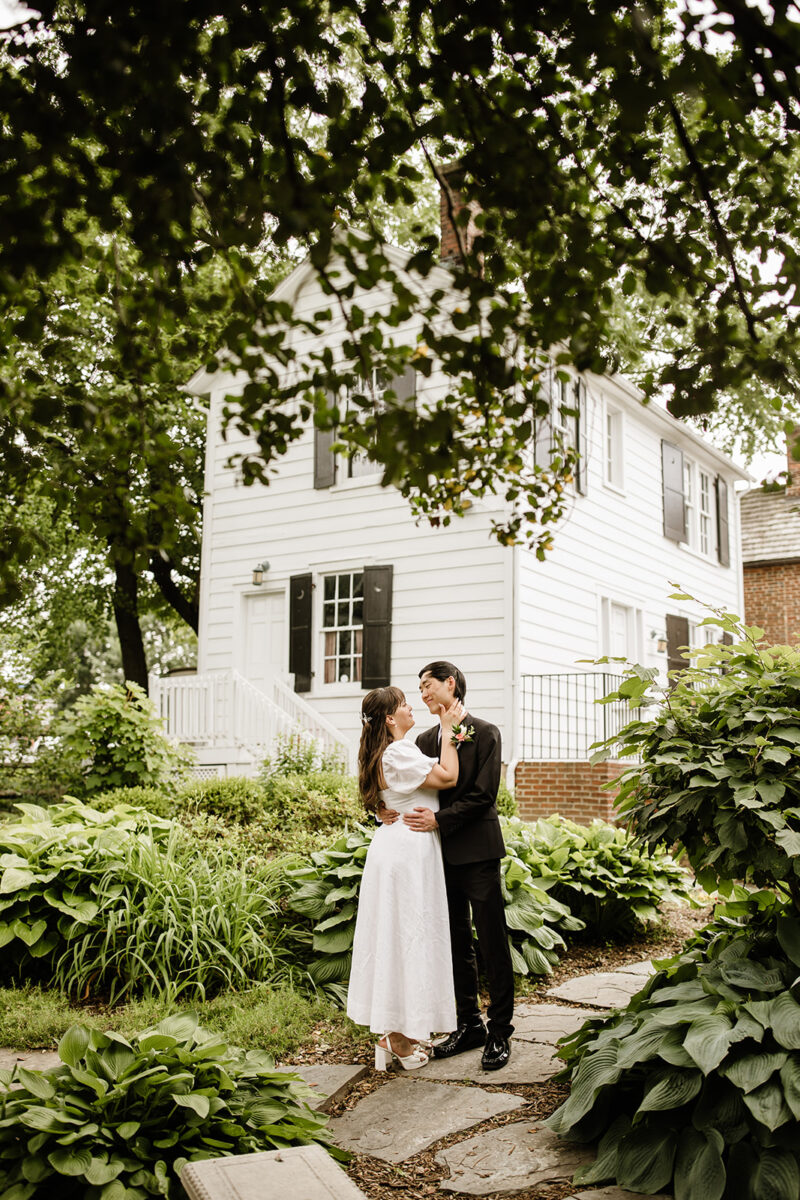 romantic bride and groom moments surrounded by lush greenery in old town fairfax