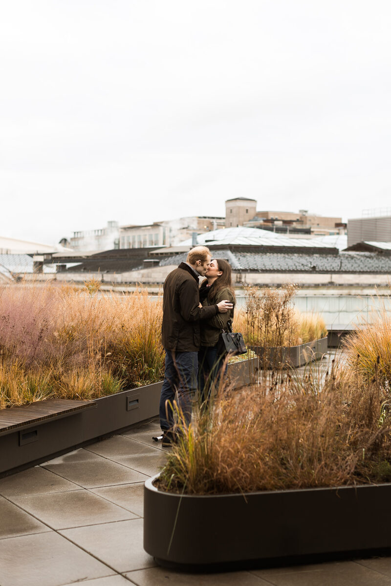 candid rooftop proposal moments at mlk library in washington dc
