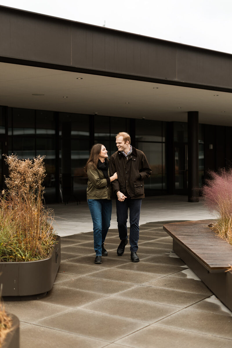 moody and rainy engagment session on a rooftop in washington dfc