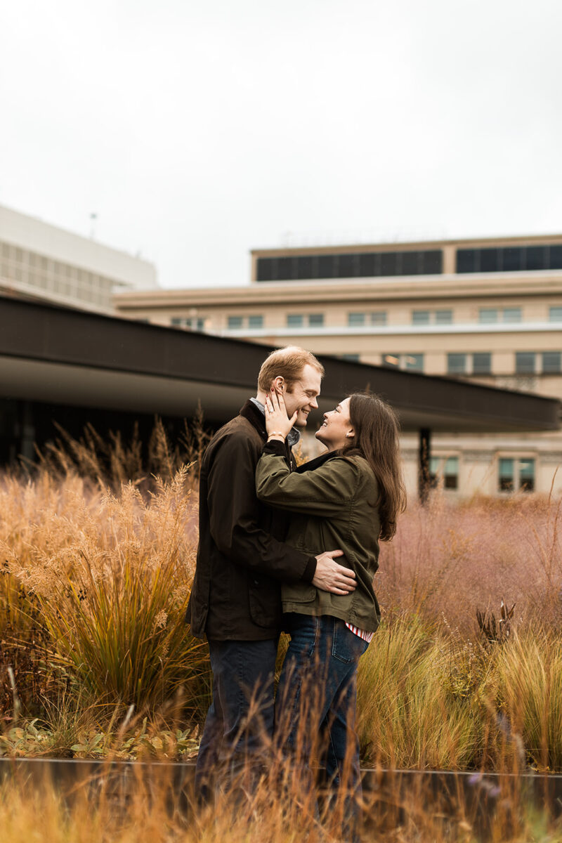 moody and rainy engagment session on a rooftop in washington dfc