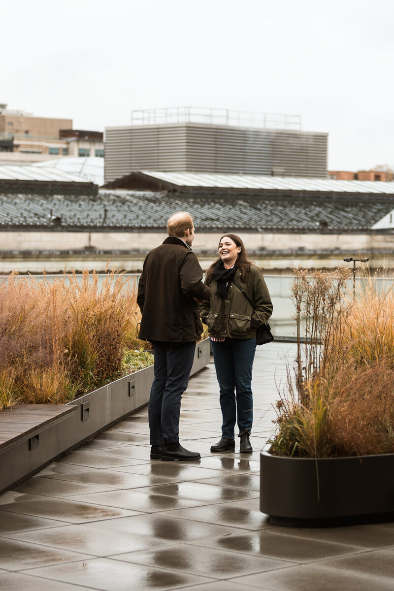 candid rooftop proposal moments at mlk library in washington dc