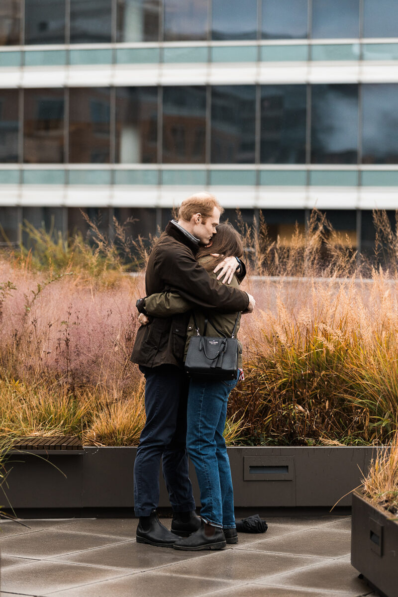 candid rooftop proposal moments at mlk library in washington dc